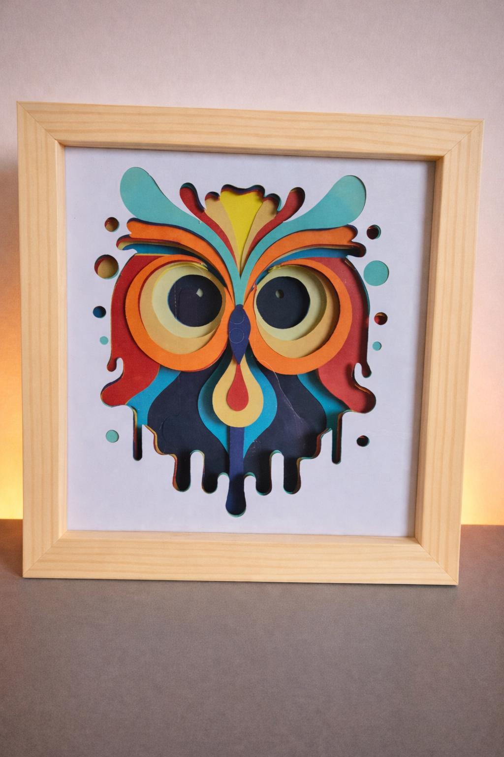 Vibrant 3D layered card-cut owl framed artwork