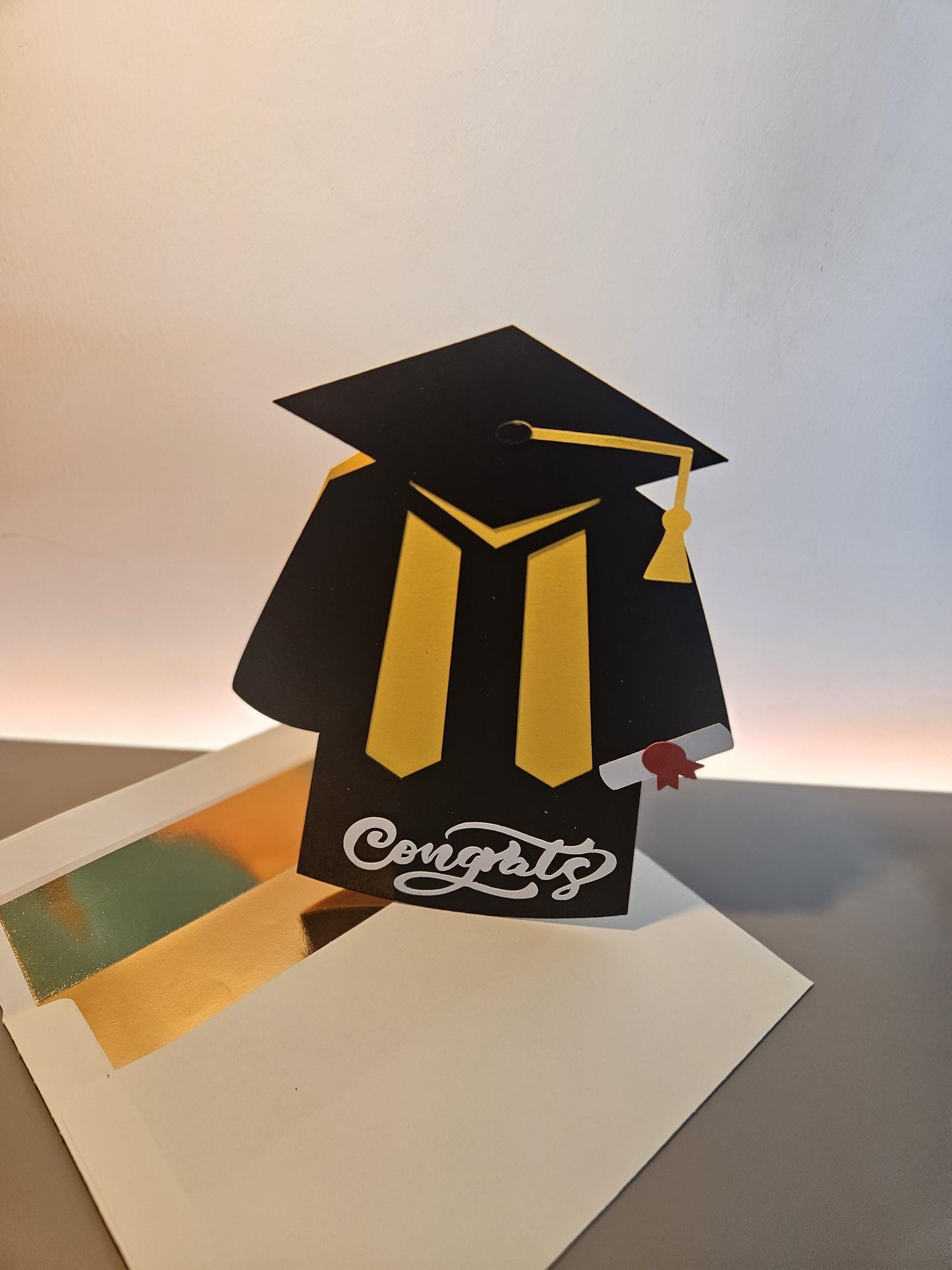 Handcrafted Graduation Card, Cap and Gown. Customisable